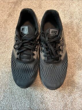 Nike Women’s Black and Gray Mesh Running Sneakers